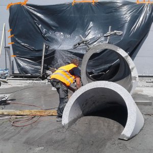 Cutting concrete and reinforced concrete with diamond wire saws