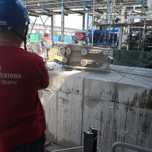 Cutting concrete and reinforced concrete with diamond wire saws